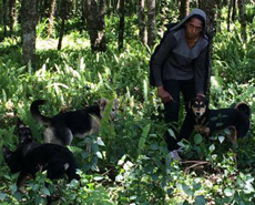 This dedicated dog-owner walked for four hours to get his four dogs vaccinated at the camp