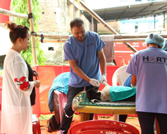 Mrs Hema Thalang - focal person for this programme in Dharan - observing surgery