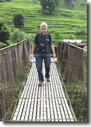 Dr Lyon braves a Nepali rope bridge