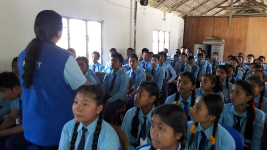 HART Comms Officer, Anjani Gurung, addressing one of the school classes
