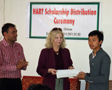 Khim Bahadur Ale being presented with his award by HART co-founder, Barbara Webb