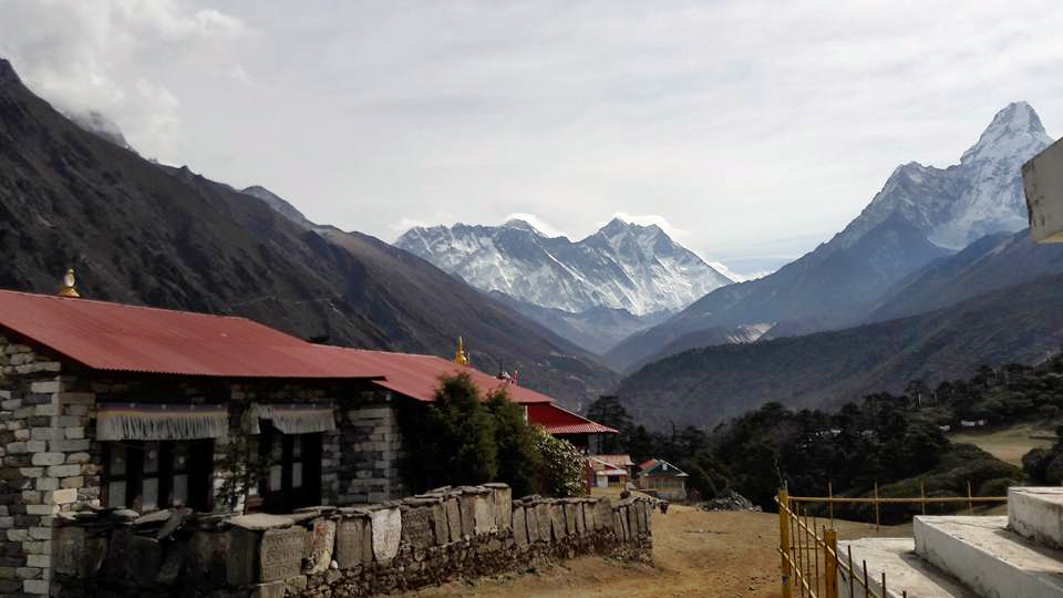 View of the Himalayas from Tengboche - the black summit of Mt Everest is just visible above the centre of the snow-covered ridge