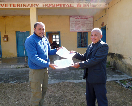 Dr Prakash Shrestha, Chief of the DLSO for Kaski District, and HART Director, Khageshwaar Sharma, complete the agreement to build the new clinic in Pokhara