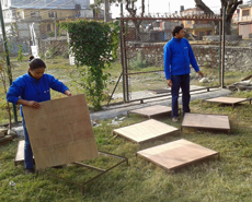 New raised sleeping platforms under construction for the Pokhara kennels