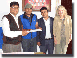 Mayor Kafle presenting our MOU to our Director, Khageshwaar Sharma, and joined by Environmental Officer, Khem Bhandari, and HART co-founder, Barbara Webb