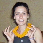French vet nurse, Zara Izzy, after presentation of her mala - a marigold garland traditionally given as a token of esteem